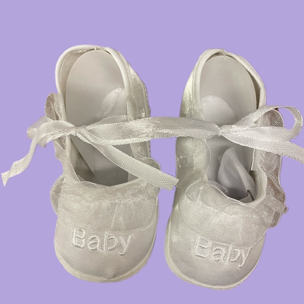 Satin baby shoes. Brand new. Packaged. 0-6month